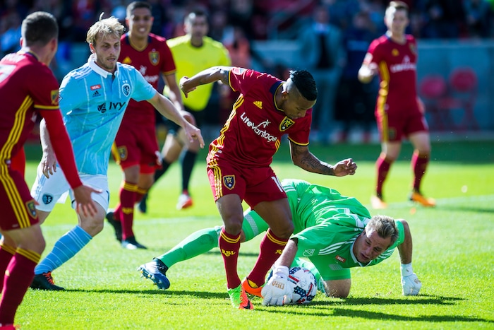(Chris Detrick  |  The Salt Lake Tribune)  Sporting Kansas City goalkeeper Andrew Dykstra (21) makes a save against Real Salt Lake forward Joao Plata (10) during the game at Rio Tinto Stadium Sunday, October 22, 2017.  
