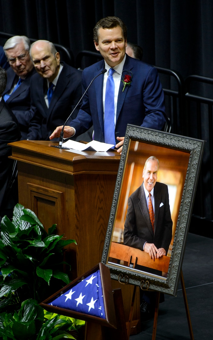 (Steve Griffin  |  The Salt Lake Tribune)  Peter Huntsman smiles as he tells stories about some of his fathers less famous business adventures, most of which lost money, during funeral services for Jon Huntsman Sr. at the Huntsman Center on the University of Utah campus in Salt Lake City Saturday February 10, 2018.