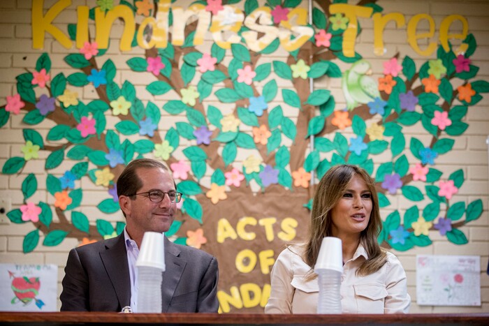 First lady Melania Trump, right, accompanied by Health and Human Services Secretary Alex Azar, left, speaks at a roundtable at the Upbring New Hope Children Center run by the Lutheran Social Services of the South in McAllen, Texas, Thursday, June 21, 2018. (AP Photo/Andrew Harnik)