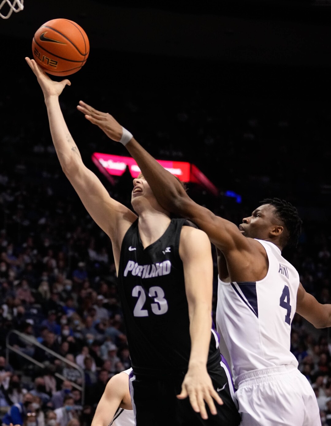 (Francisco Kjolseth | The Salt Lake Tribune) Portland Pilots forward Vasilije Vucinic (23) is pressured by Brigham Young Cougars forward Atiki Ally Atiki (4) in WCC basketball action between the Brigham Young Cougars and the Portland Pilots, at the Marriott Center, on Saturday, January 22, 2022.