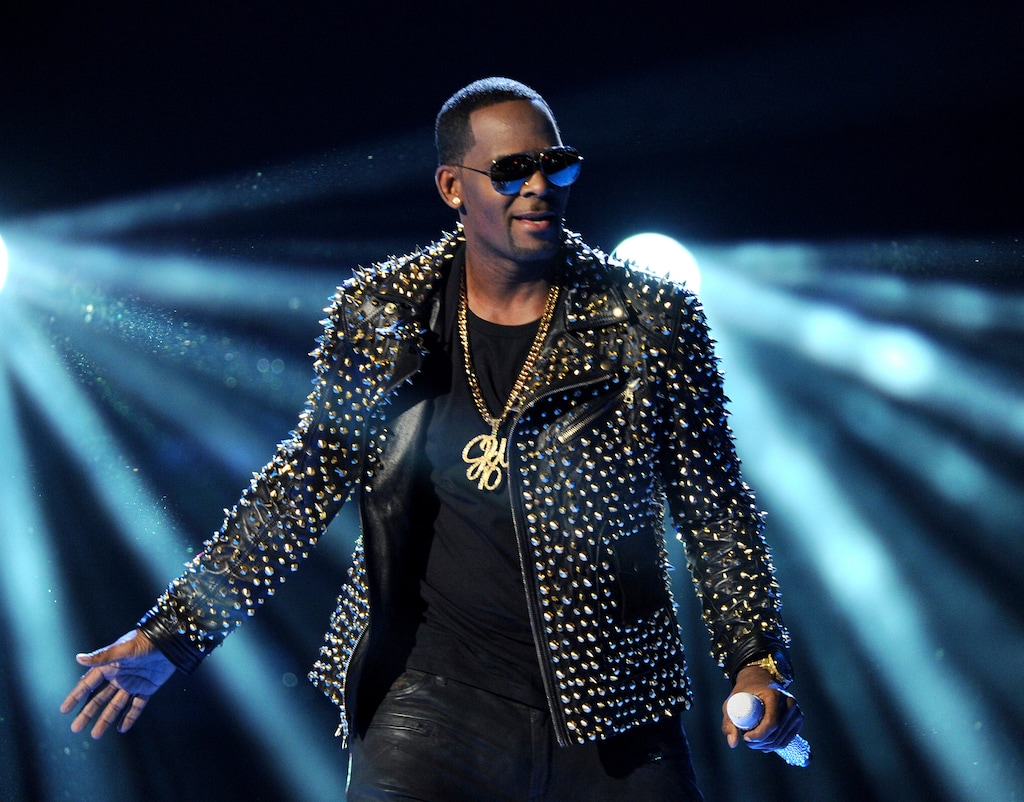 (Photo by Frank Micelotta/Invision/AP, File) In this June 30, 2013 file photo, R. Kelly performs at the BET Awards in Los Angeles. A Georgia man involved with a recent documentary detailing abuse allegations against R. Kelly told police the singer's manager threatened him. A Stockbridge police report says Timothy Savage told an officer on Jan. 3 that Don Russell had texted him saying it would be best for him and his family if the documentary didn't air. Savage said he and his wife were involved with Lifetime's "Surviving R. Kelly" series.
