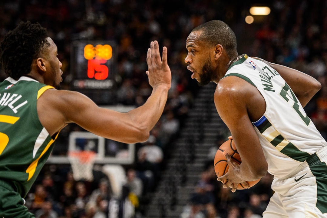 (Trent Nelson | The Salt Lake Tribune)  Utah Jazz guard Donovan Mitchell (45) defending Milwaukee Bucks forward Khris Middleton (22) as the Utah Jazz host the Milwaukee Bucks, NBA basketball in Salt Lake City on Saturday March 2, 2019.