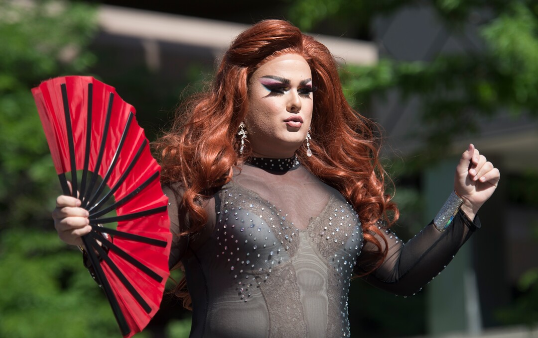(Rick Egan  |  The Salt Lake Tribune)   Lexis, dances with the Zion Curtain Sisters, in the Utah Pride Parade, in Salt Lake City, Sunday, June 3, 2018.