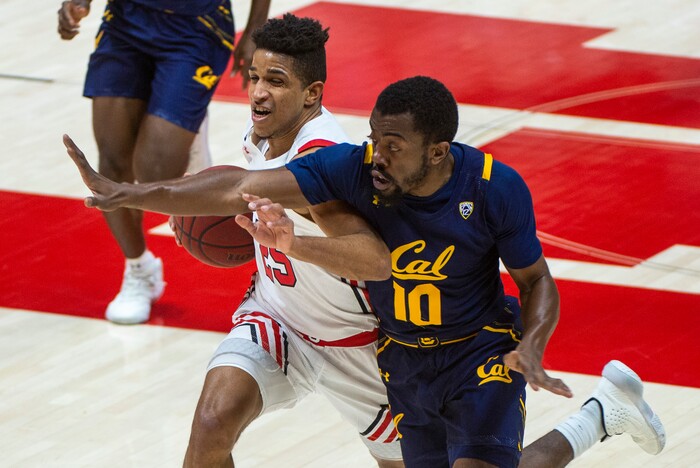 (Rick Egan | The Salt Lake Tribune) California Golden Bears guard Makale Foreman (10) defends as Utah Utes guard Alfonso Plummer (25) scores on a fast break the the end of the first half, in PAC12 Basketball action between the Utah Utes and the California Golden Bears, on Wednesday, Jan. 16, 2021.