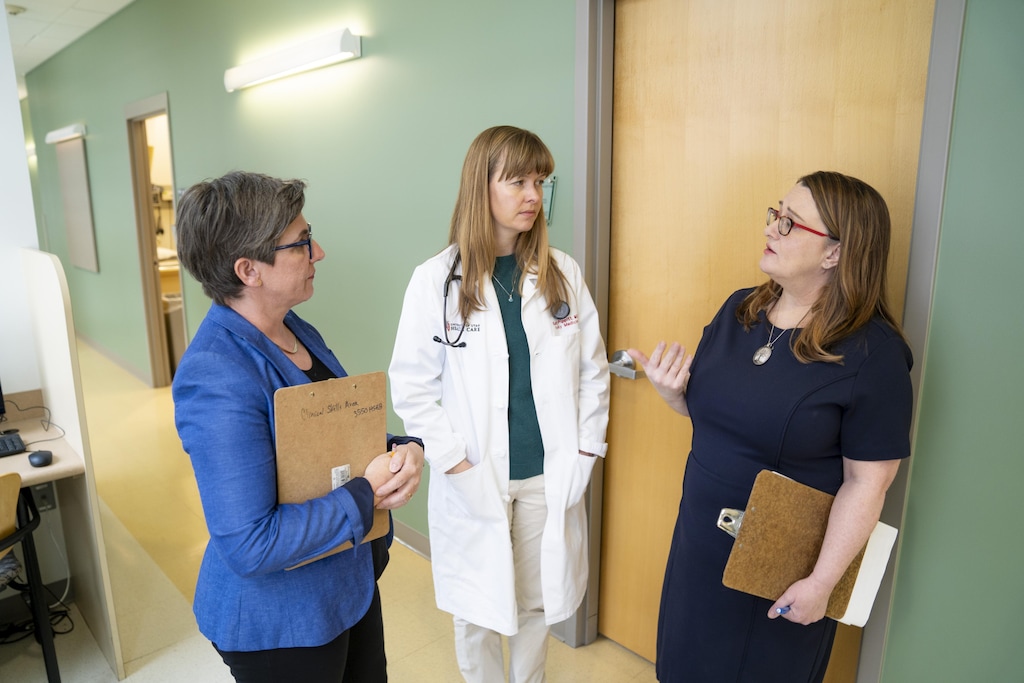 (University of Utah Health) From left, Sydney Cheek-O’Donnell (theater), Karly Pippitt (family medicine), and Gretchen Case discuss a research project that used theater techniques to improve nonverbal communication in health care conversations. The University of Utah is looking at a degree that would focus on bioethics, art and literature as tools to train empathetic caregivers.