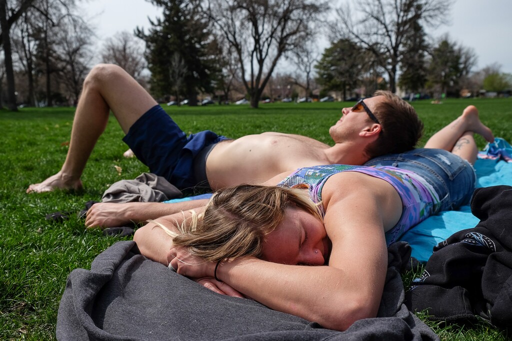 (Francisco Kjolseth  |  The Salt Lake Tribune)  Alice Pugh and Scott Ohran soak in the sun as they enjoy the seventy degree weather on Monday, April 8, 2019, at Liberty Park in Salt Lake City. The beautiful weather is expected to take a dramatic turn over the next few days with rain, a chance of snow in the valley and colder temperatures as another front moves in. 