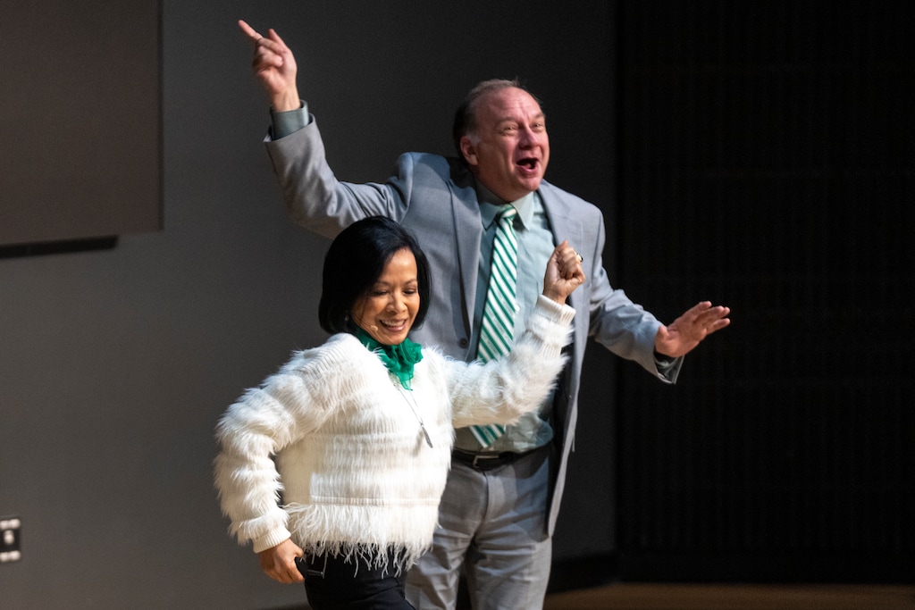(Rick Egan | The Salt Lake Tribune) UVU President Astrid Tuminez dances with Provost Wayne Vaught during a break in her annual "State of the University" address in the Keller Building on Wednesday, Jan 14, 2026. When Tuminez steps down at the end of April, Vaught will take over as acting president.
