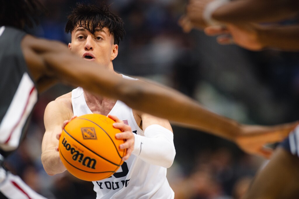 (Rachel Rydalch | The Salt Lake Tribune) Brigham Young Cougars guard Alex Barcello (13) brings down the ball to start offense during the NIT quarter final game against Washington State Cougars at the Marriott Center on Wednesday, March 23, 2022.
