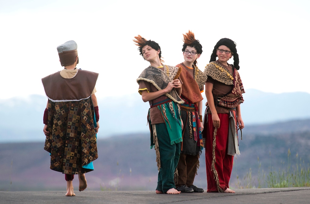(Rick Egan  |  The Salt Lake Tribune)    
Lamanite warriors and Nephite soldiers kill time before the Mormon Miracle Pageant on Wednesday, June 12, 2019.  The final run for the pageant continued through Saturday, June 22.