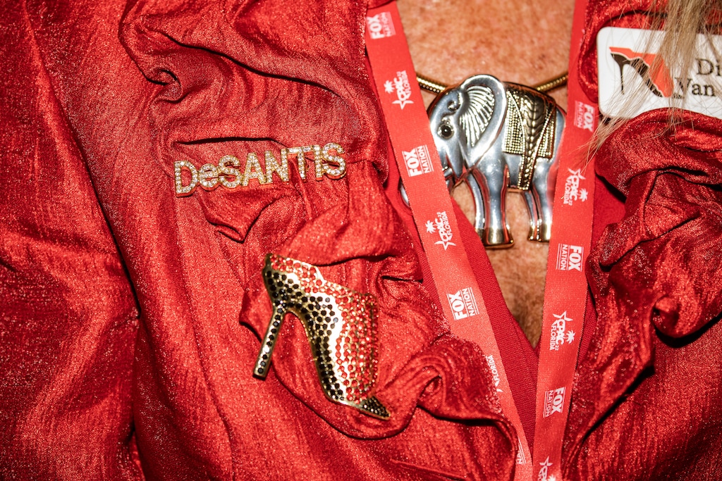 (Damon Winter | The New York Times)

An attendee wears a pin supporting Florida Gov. Ron DeSantis at the Conservative Political Action Conference (CPAC) in Orlando, Fla., Feb. 25, 2022. "While I'm quite willing to believe, for example, that Ron DeSantis would be Florida's Orban if he could, state governors don't have as much repressive power as rulers of sovereign nations," writes New York Times columnist Paul Krugman.