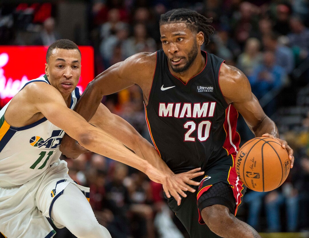 (Rick Egan  |  The Salt Lake Tribune)     Utah Jazz guard Dante Exum (11) defends as Miami Heat forward Justise Winslow (20) takes the ball down the middle, in NBA action between Utah Jazz and Miami Heat, at Viint Smart Home Arena Wednesday, Dec. 12, 2018.