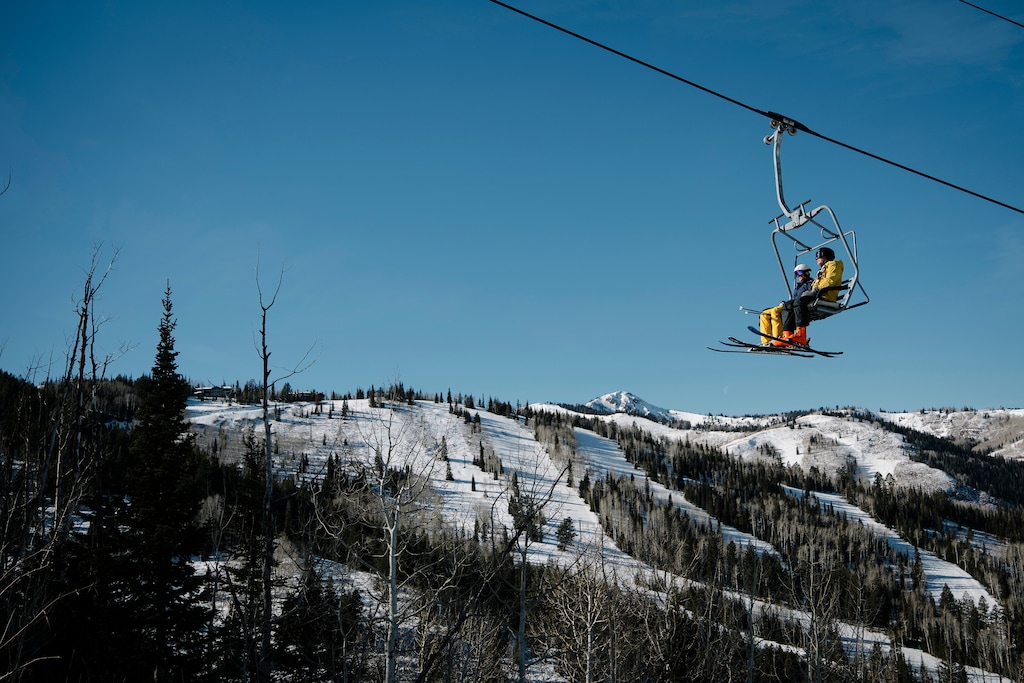 (Alex Goodlett | The New York Times) Skiers ride a lift at Deer Valley in Park City, Dec. 11, 2025. Thirty miles from Salt Lake City in Utah's Wasatch Mountains, the former silver-mining hub turned sporty mecca of Park City is already well known to the skiers who tackle the slopes at sprawling Park City Mountain Resort, the country's biggest ski area, and Deer Valley, known for its luxurious amenities.