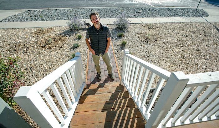 (Steve Griffin  |  The Salt Lake Tribune)  Mickey Campbell stands outside his Salt Lake City home, Thursday October 5, 2017, where he was told by the city his yard violated a law requiring at least 33% of front yard and park strip to be covered in vegetation. 