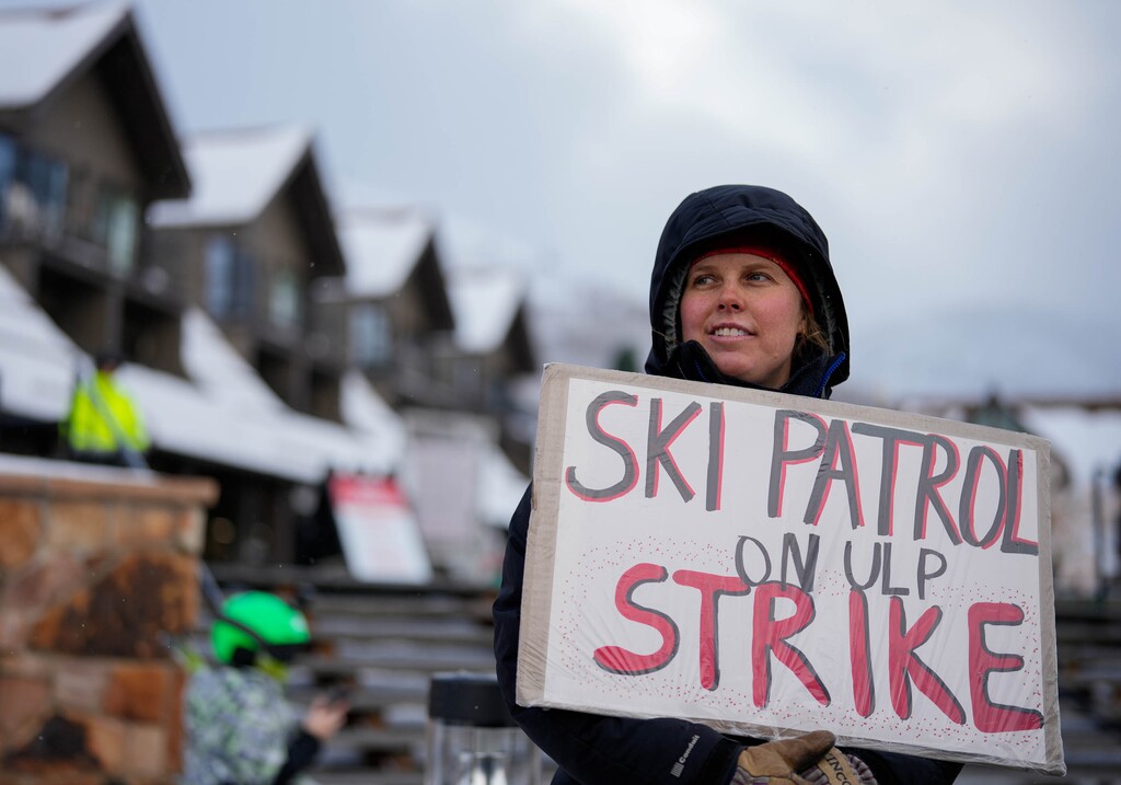 (Francisco Kjolseth  | The Salt Lake Tribune) Ski patroller Hannah Halsted joins the picket line as members of the Park City ski patrol strike against Park City Mountain and its owner, Vail Resorts, in January 2025.