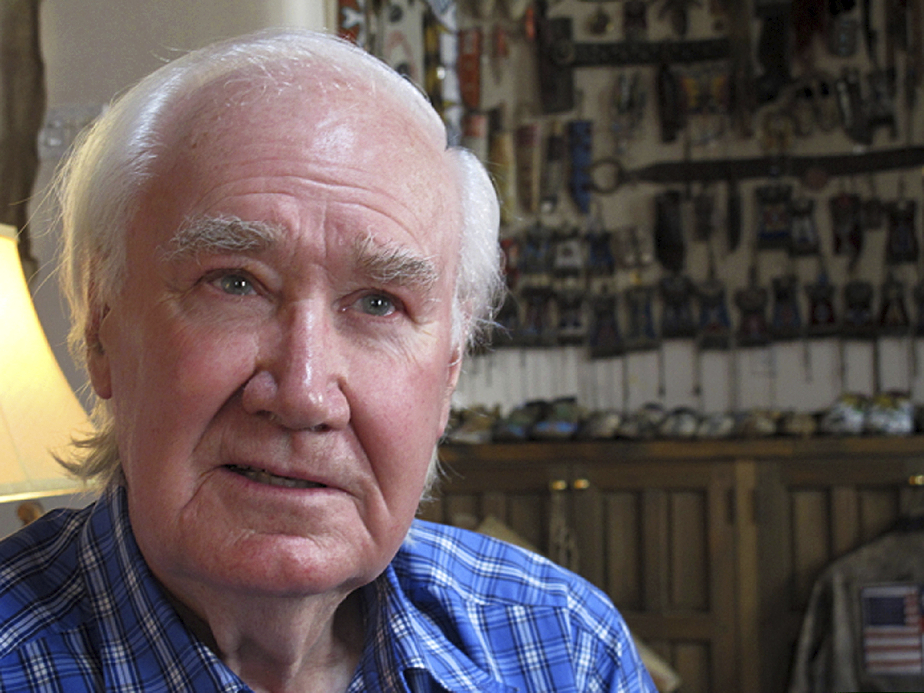 (Jeri Clausing | AP) In this March 22, 2013 file photo, antiquities dealer and author Forrest Fenn poses in his home in Santa Fe, N.M. People who’ve had to rescue imperiled treasure seekers in the Rocky Mountains say they're glad to hear that the legendary Fenn treasure is found. Retired Santa Fe art and antiquities dealer Forrest Fenn announced June 6 that a man who doesn't want to be named recently found the estimated $2 million chest containing coins, gold nuggets and other valuables.