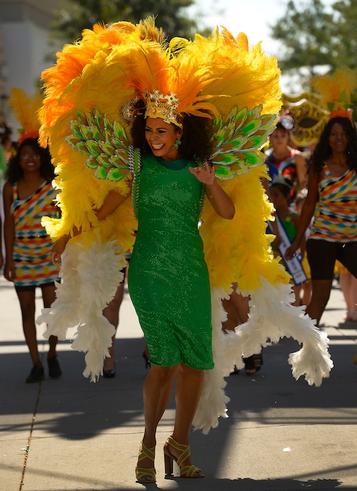 (Leah Hogsten | The Salt Lake Tribune)
Nubia Siller leads the dancers and drummers during Salt Lake City's 2015 Brazilian Festival