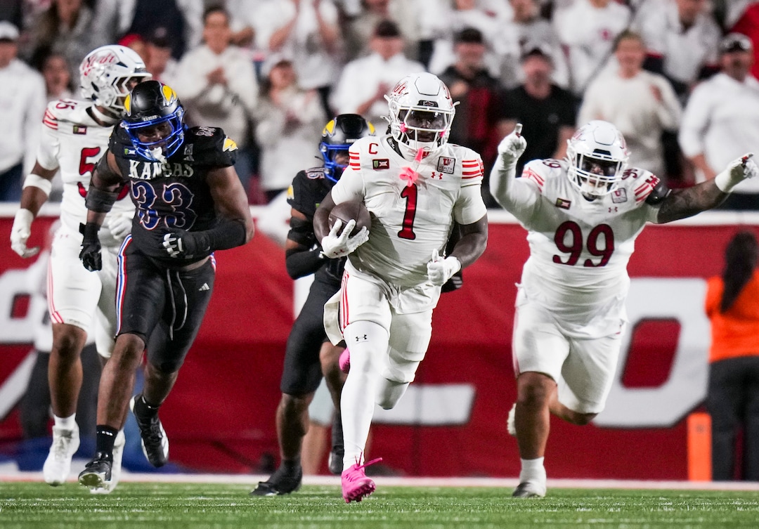 (Bethany Baker  |  The Salt Lake Tribune) Utah Utes running back Wayshawn Parker (1) runs the ball for 90 yards for a touchdown during the game between the Utah Utes and the Kansas Jayhawks at Rice-Eccles Stadium in Salt Lake City on Saturday, Oct. 10, 2026.