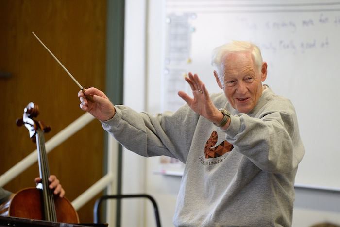 (Francisco Kjolseth | The Salt Lake Tribune) Jack Ashton, former longtime Utah Symphony violinist, for more than 30 years, works with the Young Artist Chamber Players at Highland High recently. The youth orchestra is getting ready for a concert tour to Europe. Ashton died March 15, 2025, at age 86.
