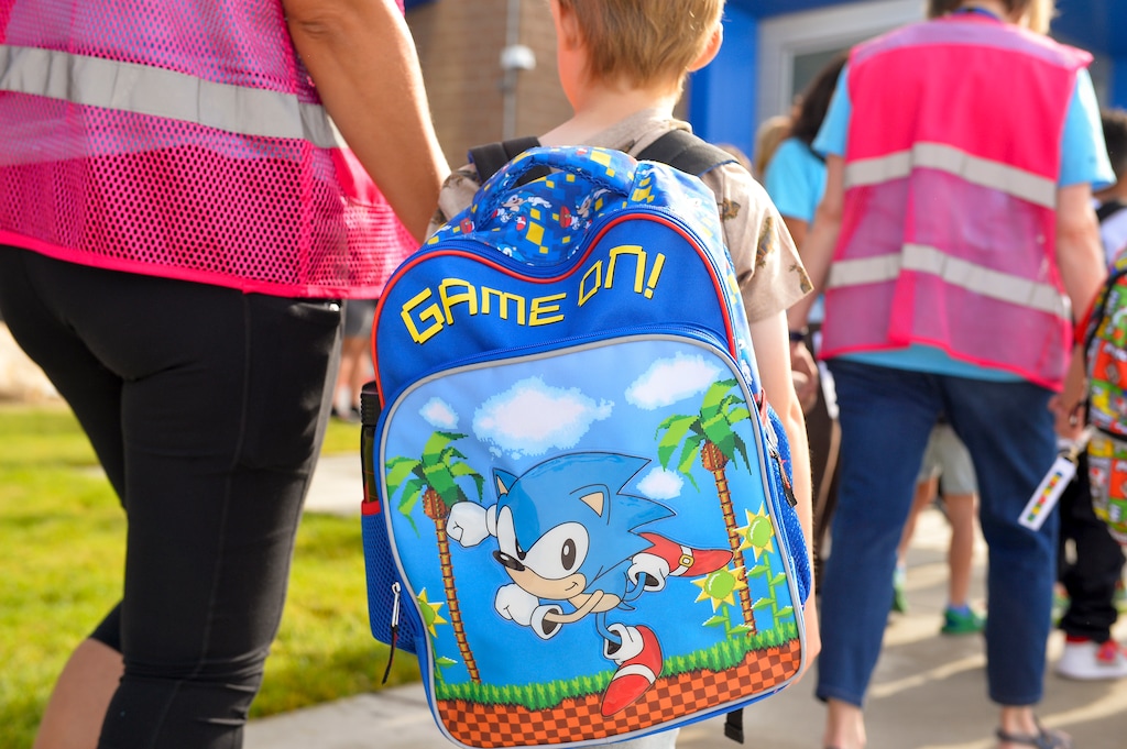 (Chris Samuels | The Salt Lake Tribune) Students enter Glacier Hills Elementary in Sandy for the first day of the school year, Monday, Aug. 15, 2022. Student test scores have improved since the worst of the pandemic in 2020-2021, but they're not back to the prior levels yet.