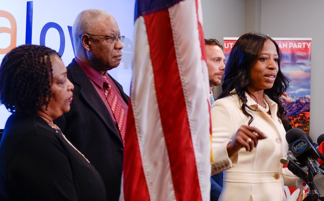 Leah Hogsten  |  The Salt Lake Tribune   Mia Love, the former two-term republican representative from Utah's 4th Congressional District held a press conference at the Utah Republican Party headquarters, Nov. 26, 2018 to discuss her accomplishments, Washington politics, President Donald Trump and her future. Love was joined at the lecturn with her parents Mary Bourdeau and Jean Maxine Bourdeau, husband Jason, daughter Alessa and son Peyton.