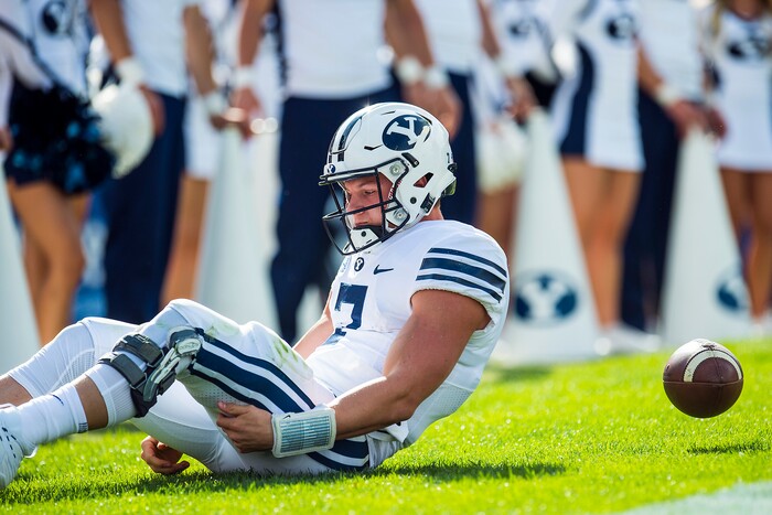 (Chris Detrick  |  The Salt Lake Tribune)  Brigham Young Cougars quarterback Beau Hoge (7) remains on the ground after being tackled for a safety by Wisconsin Badgers linebacker Tyler Johnson (59) during the game at LaVell Edwards Stadium Saturday Saturday, September 16, 2017. Wisconsin Badgers defeated Brigham Young Cougars 40-6.