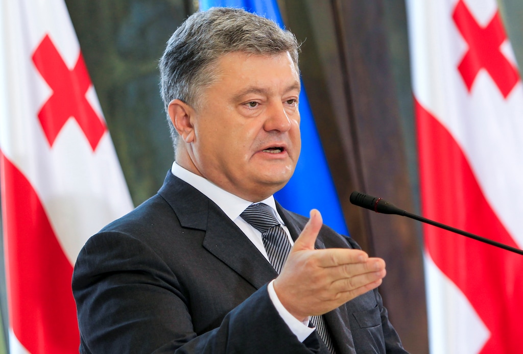 FILE - In this Tuesday, July 18, 2017 file photo, Ukrainian President Petro Poroshenko speaks at a news conference in Tbilisi, Georgia, during an official visit. The Ukrainian president and businessman moved the country toward closer relations with the West and is now presiding over a war against Russian-backed separatists. He appears to have been targeted by hackers at least seven times during April to September 2015, according to data from the cybersecurity firm Secureworks. (AP Photo/Shakh Aivazov)