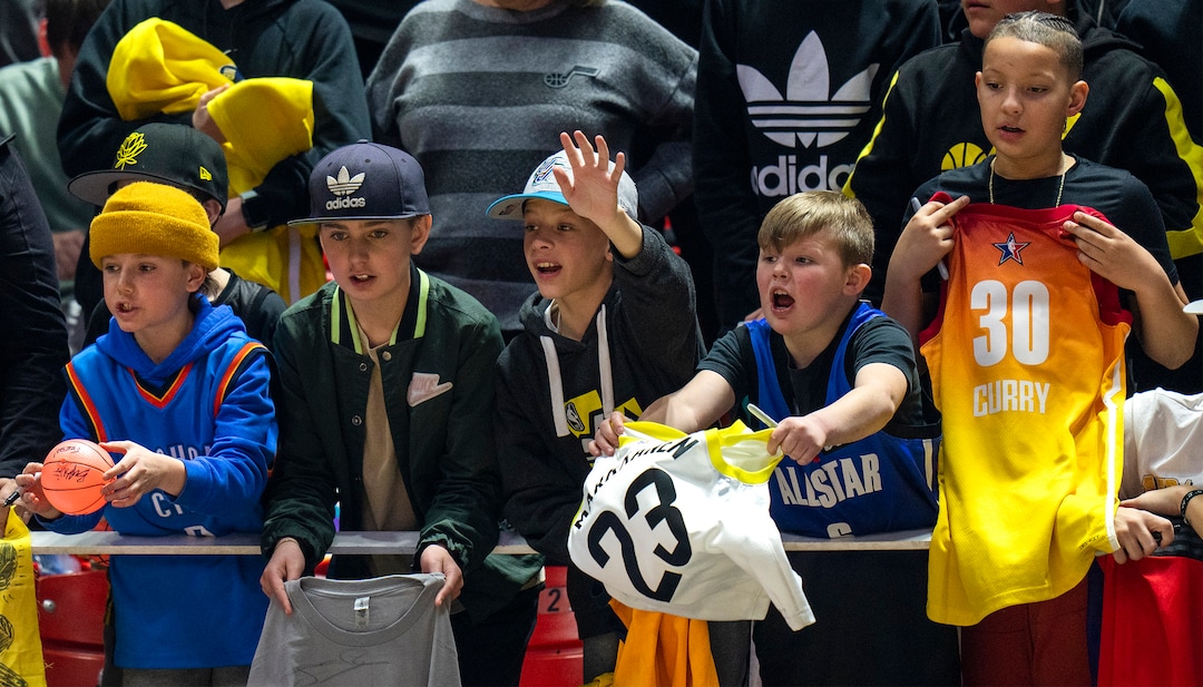 (Rick Egan | The Salt Lake Tribune) Fans try to get the attention of Lauri Markkanen, during the Western team All-Star Practice at the Jon M. Huntsman Center, on Saturday, Feb. 18, 2023.