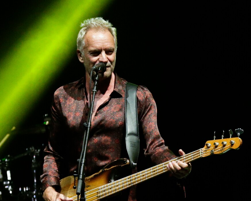 (Arnulfo Franco | The Associated Press) In this Oct. 19, 2018, file photo, Sting performs during a concert. A new book examines the Catholicism laced through the singer's music.