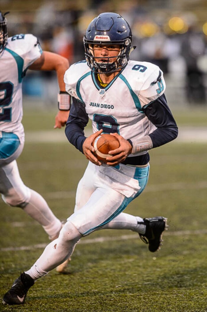(Trent Nelson | The Salt Lake Tribune)  Juan Diego quarterback Zachary Hoffman runs the ball. Summit Academy faces Juan Diego High School in a class 3A state semifinal football game at Weber State University's Stewart Stadium, Saturday November 4, 2017.