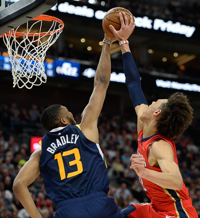 (Francisco Kjolseth | The Salt Lake Tribune) Utah Jazz center Tony Bradley (13) moves in for the monster block on New Orleans Pelicans center Jaxson Hayes (10) as the Utah Jazz host the New Orleans Pelicans in their NBA basketball game at Vivint Smart Home Arena in Salt Lake City on Sat. Nov. 23, 2019.
