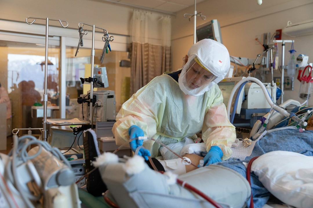 (photo courtesy Intermountain Healthcare) Hospital staff at Intermountain Medical Center in Murray care for patients with COVID-19 on June 9, 2020.