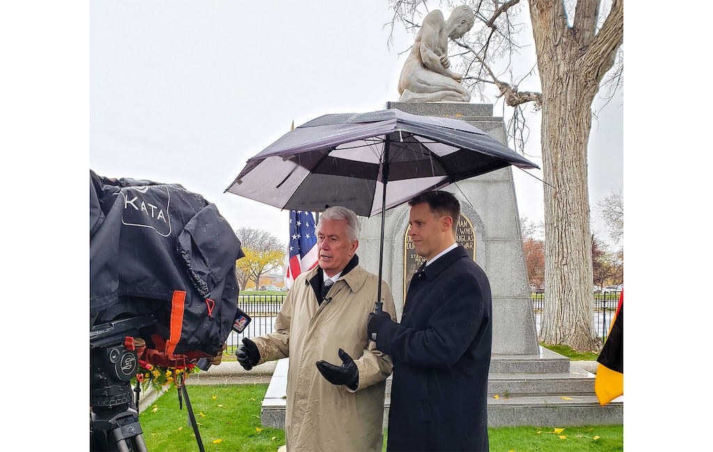 (Charles Howard | Special to The Tribune) Apostle Dieter F. Uchtdorf and Utah’s honorary German consul, James Burton, pay tribute to war dead at Fort Douglas Cemetery on Sunday, Nov. 19, 2023.