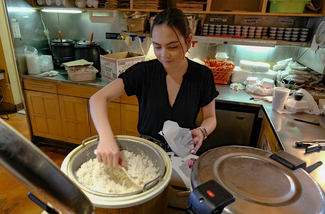 (Francisco Kjolseth  |  The Salt Lake Tribune) Jorg Pellazar prepares a take out order on Saturday, March 7, 2020, at the popular Sampan Asian Cuisine restaurant in Salt Lalke City after operating for nearly three decades.