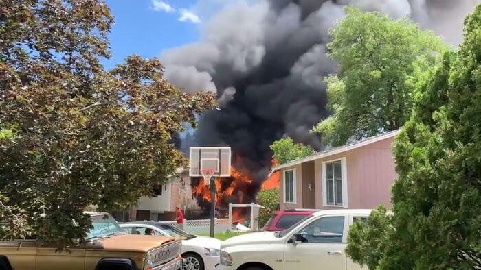(Courtesy of Emilee Bond, via FOX 13)
A small airplane with six people on board crashed into a West Jordan neighborhood on Saturday, July 25 2020.