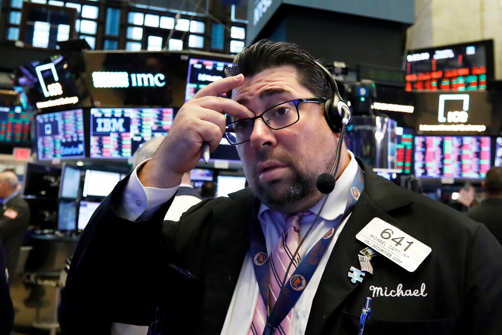 (AP Photo/Richard Drew) Trader Michael Capolino works on the floor of the New York Stock Exchange, Thursday, Oct. 11, 2018. The market's recent decline was set off by a sharp drop in bond prices and a corresponding increase in yields last week and early this week.