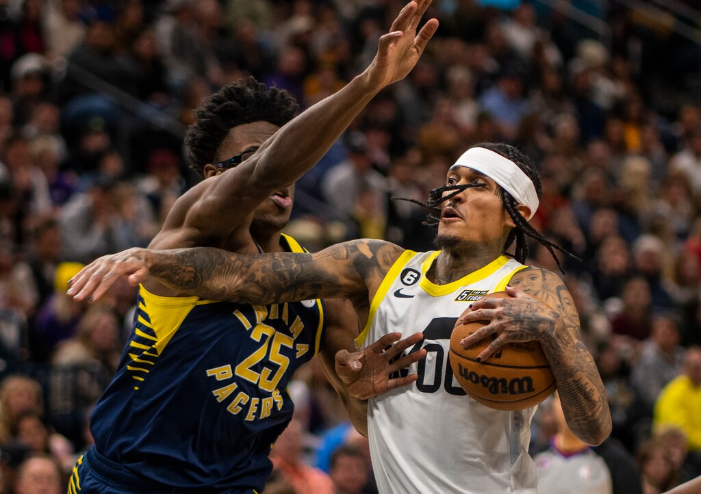 (Rick Egan | The Salt Lake Tribune) Indiana Pacers forward Jalen Smith (25) tries to stop Utah Jazz guard Jordan Clarkson (00) from getting to the hoop, in NBA action between the Utah Jazz and the Indiana Pacers at Vivint Arena, on Friday, Dec. 2, 2022.