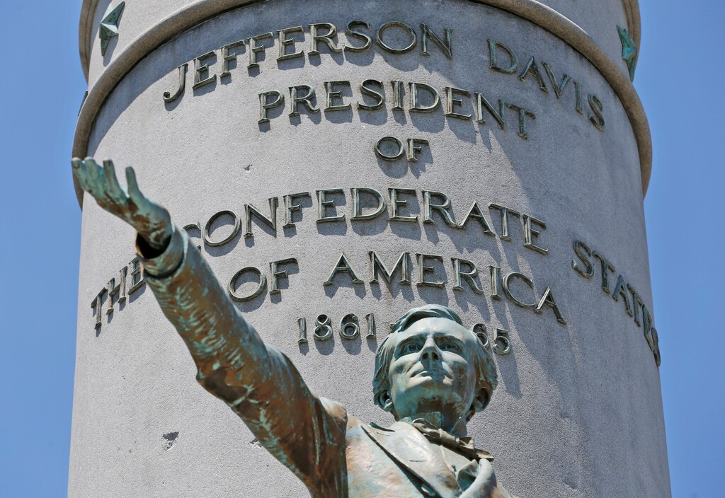 This Wednesday, June 28, 2017, shows statue of Confederate president Jefferson Davis on Monument Avenue in Richmond, Va. As cities across the United States are removing Confederate statues and other symbols, dispensing with what some see as offensive artifacts of a shameful past marked by racism and slavery, Richmond is taking a go-slow approach. (AP Photo/Steve Helber)