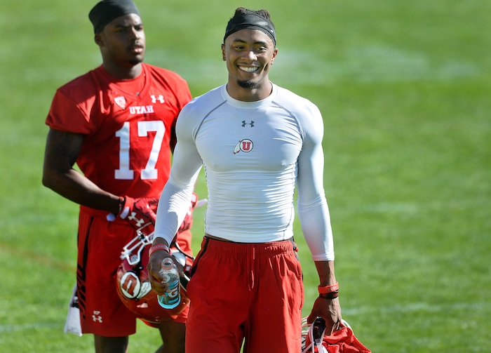 Scott Sommerdorf | The Salt Lake Tribune
New Utah WR Darren Carrington II smiles as he walks off the field after the first day of Utah fall football camp, Friday, July 28, 2017. during the first day of Utah fall football camp, Friday, July 28, 2017.