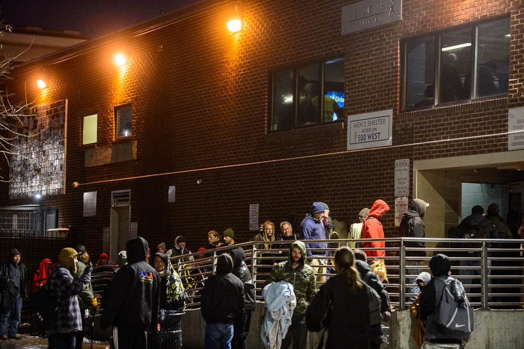 (Trent Nelson | Tribune file photo) Men line up for beds at The Road Home shelter in Salt Lake City on Wednesday Jan. 23, 2019.