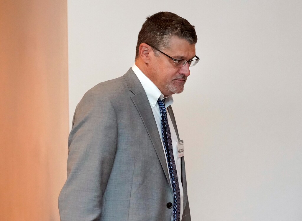 FILE - In this Nov. 14, 2017, file photo, Glenn R. Simpson, co-founder of the research firm Fusion GPS, arrives for a scheduled appearance before a closed House Intelligence Committee hearing on Capitol Hill in Washington. Sen. Dianne Feinstein, D-Calif., has released a transcript from an interview with Simpson, the firm that commissioned a dossier of allegations about President Donald Trump's ties to Russia. (AP Photo/Pablo Martinez Monsivais, File)