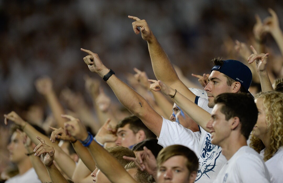 (Francisco Kjolseth  |  The Salt Lake Tribune)  BYU fans cheer on their team as they battle California during the second half of the NCAA college football game, Saturday, Sept. 8, 2018, at LaVell Edwards stadium in Provo, Utah.