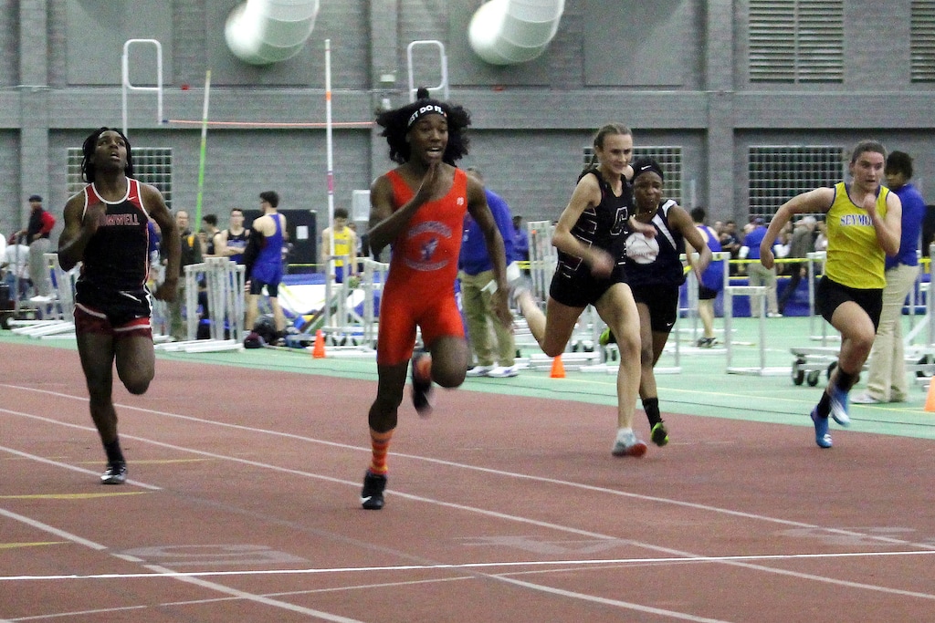 (Pat Eaton-Robb | AP file photo) High school transgender athlete Terry Miller, second from left, wins the final of the 55-meter dash over transgender athlete Andraya Yearwood, far left, and other runners in the Connecticut girls Class S indoor meet on Feb. 7, 2019.