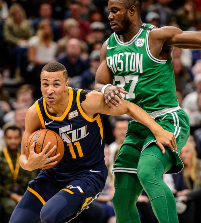 (Trent Nelson | The Salt Lake Tribune)  
Utah Jazz vs. Boston Celtics, NBA basketball in Salt Lake City, Wednesday March 28, 2018. Utah Jazz guard Dante Exum (11) defended by Boston Celtics forward Semi Ojeleye (37).