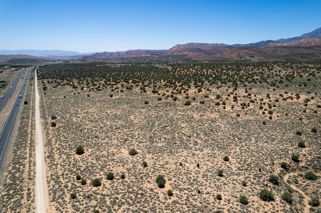 (Rick Egan | The Salt Lake Tribune) Land owned by the Bureau of Land Management adjacent to Interstate 15 in Washington County, Thursday, May 12, 2022. The town of Toquerville is looking to acquire the land that private developers would turn into a sprawling recreational complex, with parks, trails and a charter school.