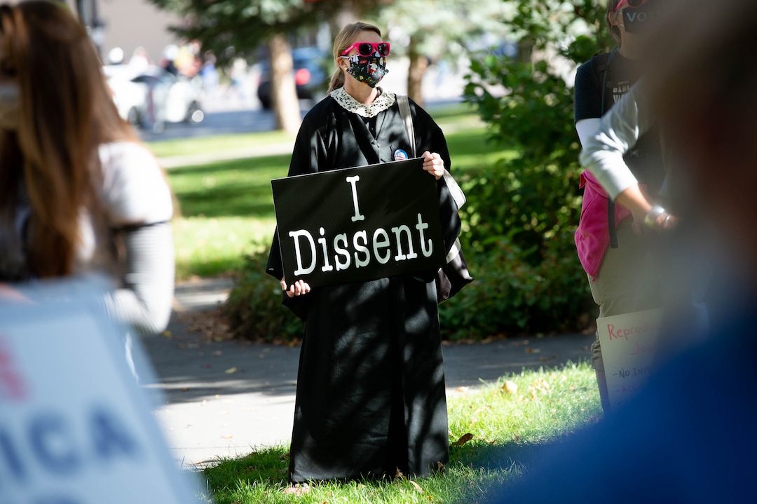 (Francisco Kjolseth  |  The Salt Lake Tribune) Kris Bowman, dressed as late Supreme Court Justice Ruth Bader Ginsburg, joins demonstrators gather in Salt Lake City, as they unite with Women’s March rallies happening in Washington D.C. and around the country on Saturday, Oct. 17, 2020, to signal their opposition to President Donald Trump and his policies, including his push to fill the seat of RBG.