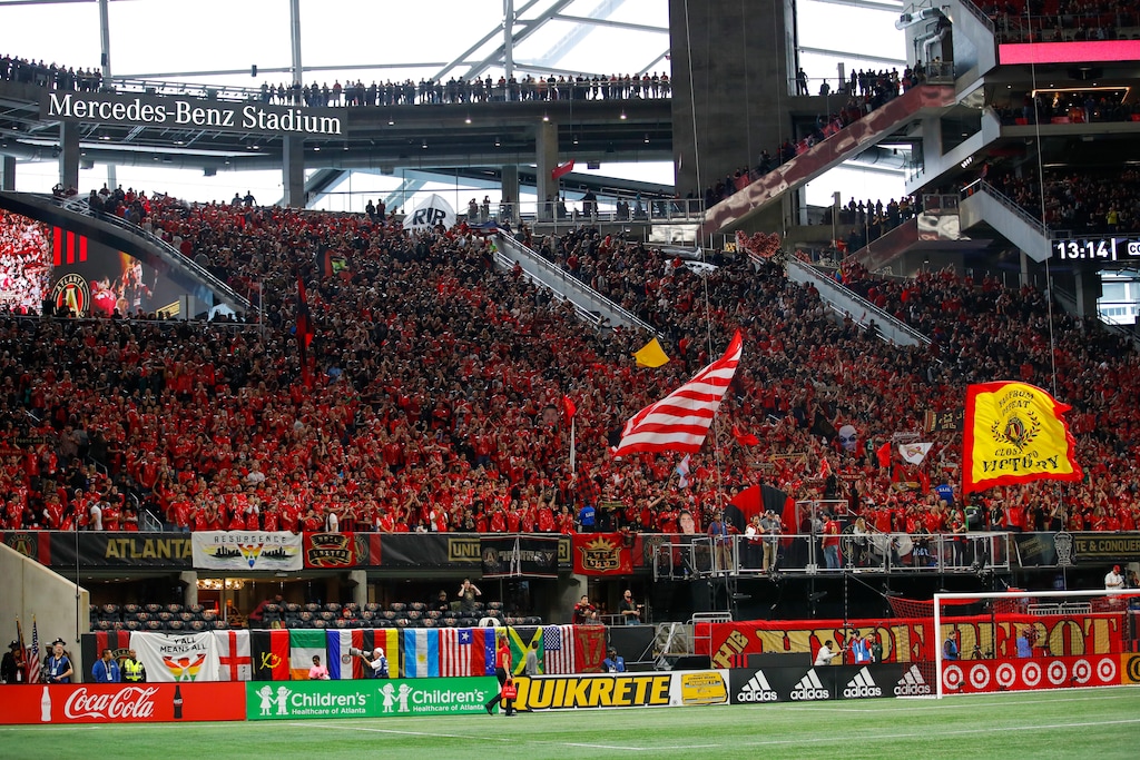 Fans file into Mercedes-Benz Stadium before a Major League Soccer game between D.C. United and Atlanta United, Sunday, March 11, 2018, in Atlanta. (AP Photo/Todd Kirkland)
