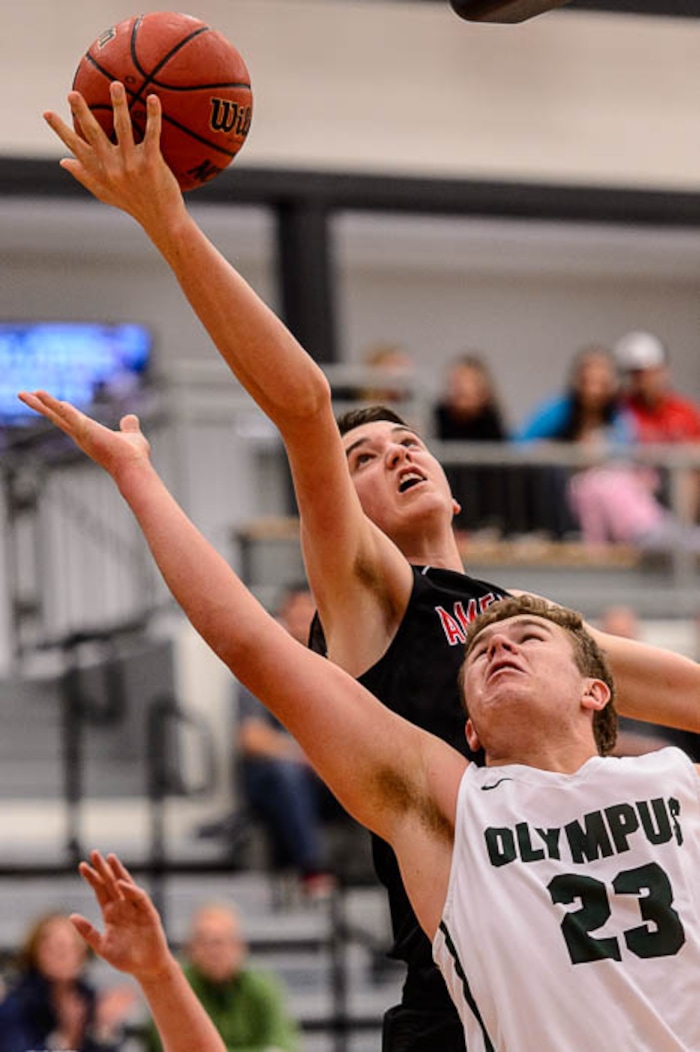 (Trent Nelson | The Salt Lake Tribune)  American Fork's Isaac Johnson and Olympus's Harrison Creer as American Fork hosts Olympus in the Utah Elite Eight tournament, Saturday December 9, 2017.