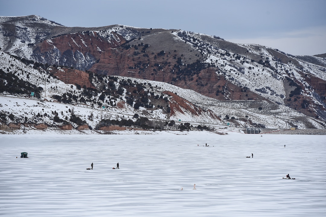 (Francisco Kjolseth  |  The Salt Lake Tribune)  Ice fisherman speckle the ice at Echo Reservoir with an elevation of 5,500 feet in Summit County next to Coalville which could become a state park.