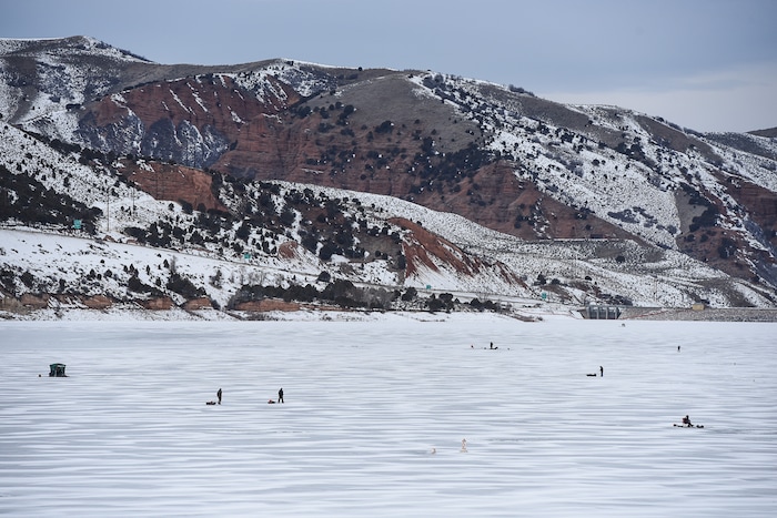 (Francisco Kjolseth | The Salt Lake Tribune) Ice fisherman speckle the ice at Echo Reservoir with an elevation of 5,500 feet in Summit County next to Coalville which could become a state park.
