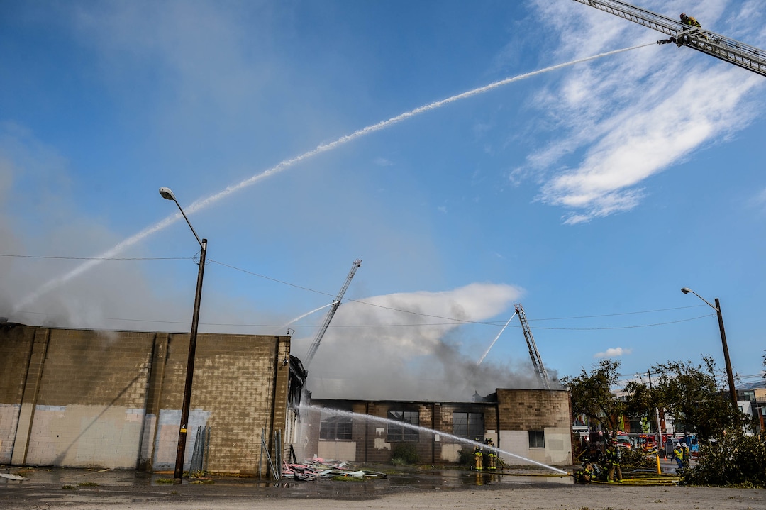 (Trent Nelson  |  The Salt Lake Tribune) Crews work to extinguish a fire at 800 South 200 West in Salt Lake City on Wednesday, Sept. 9, 2020.